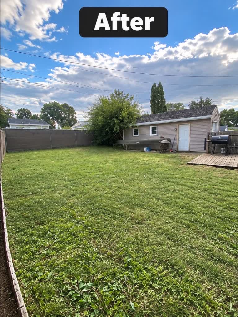 Freshly mowed green lawn behind a Dubuque home